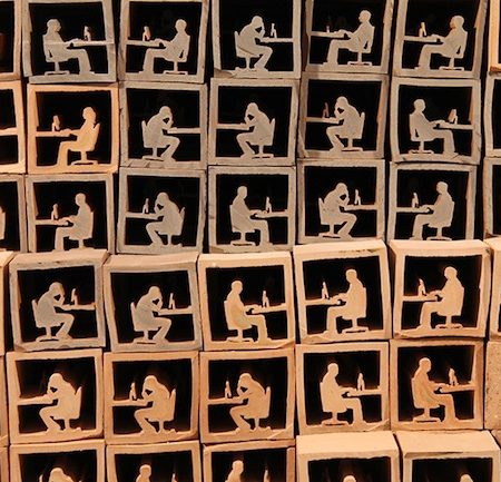Epps' ceramic figures depict workers trapped within their cubicles, grinding out an eternity of menial office work.