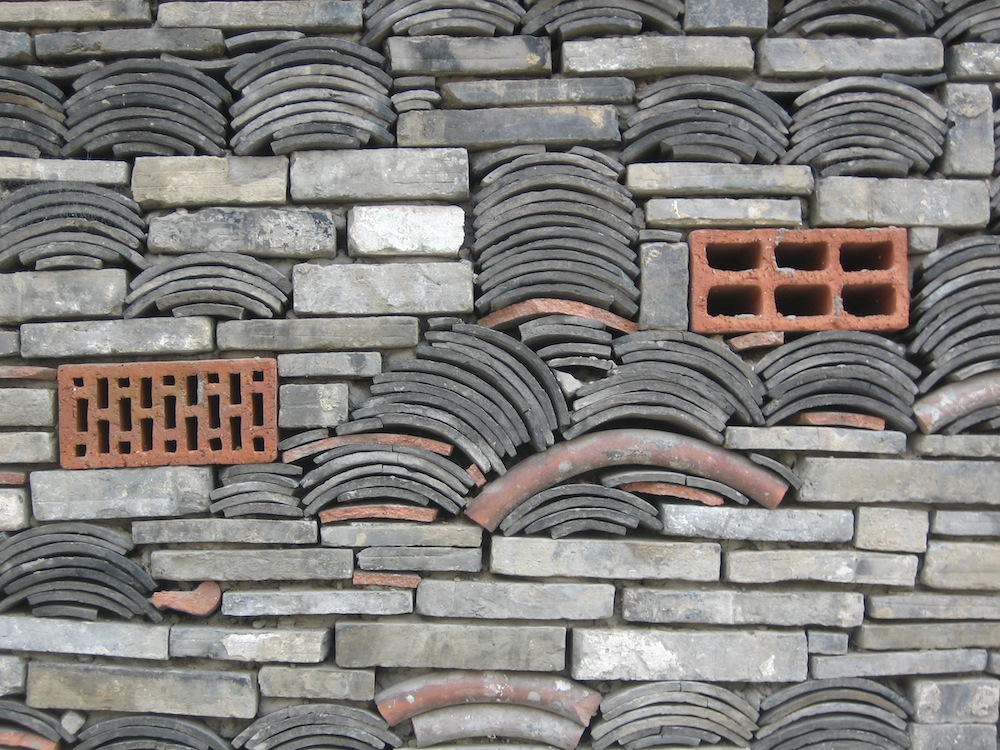 Architect Wang Shu’s Ningbo History Museum in Ningbo, China incorporates “Wa Pan” into its exterior; a traditional building technique that uses found material fragments.