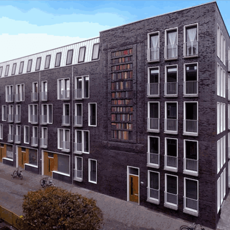 Amsterdam artist Sanja Medić's building-facade-as-bookshelf, De Batavier (De Boekenkast), in the Lootsstraat neighborhood of Amsterdam.